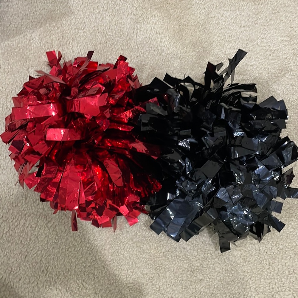 Red and black pom poms